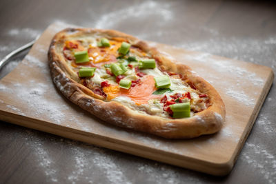 High angle view of pizza on table