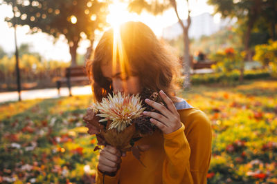 Woman holding flower