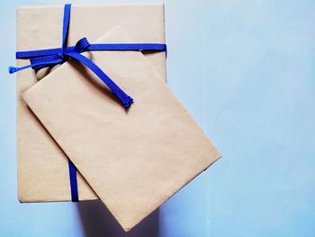 High angle view of blue paper on table