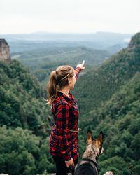 Woman standing on mountain