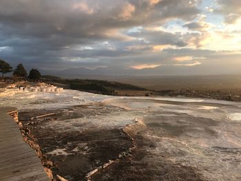 Scenic view of landscape against sky during sunset