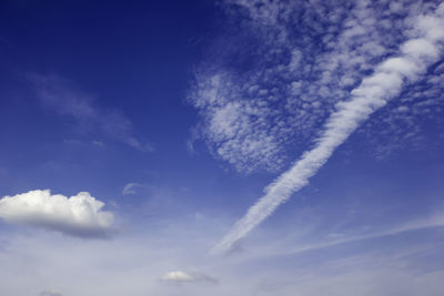 Low angle view of vapor trail in sky