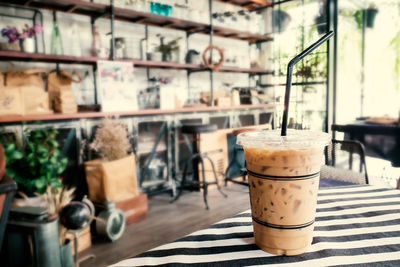 Close-up of coffee in glass on table