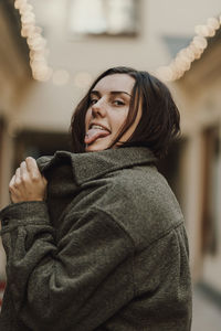 Woman sticking her tongue out