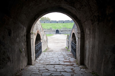 Rear view of people in old building