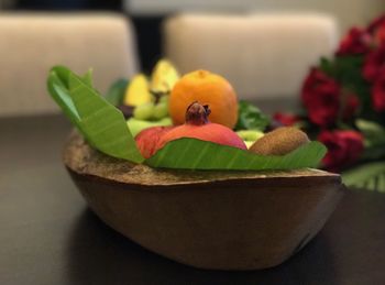 Close-up of small potted plant on table