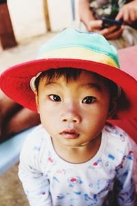 Portrait of cute girl wearing hat