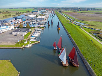 High angle view of boats moored at harbor