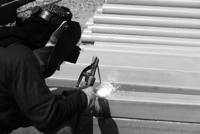 Man working on metal in factory