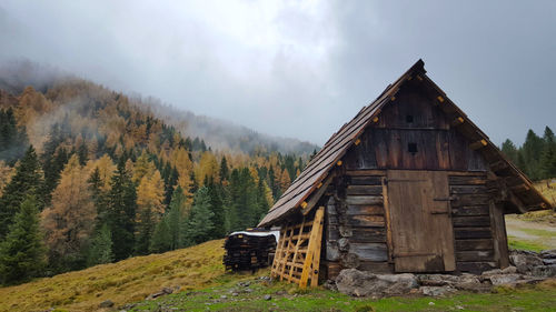 Built structure on land against sky