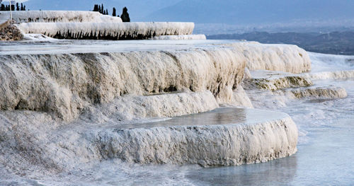 Scenic view of frozen sea against sky