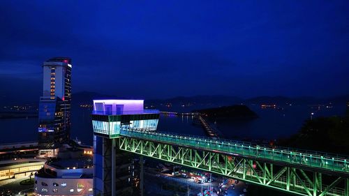 High angle view of illuminated buildings at night
