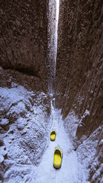 High angle view of water flowing through rocks