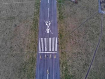 High angle view of information sign on field