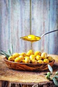 Yellow fruits on wood