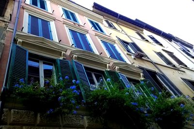 Low angle view of building against blue sky