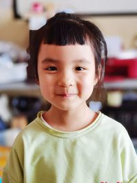 Portrait of cute girl at home