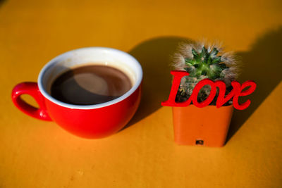Close-up of coffee cup on table