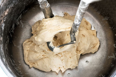 High angle view of dough in bowl