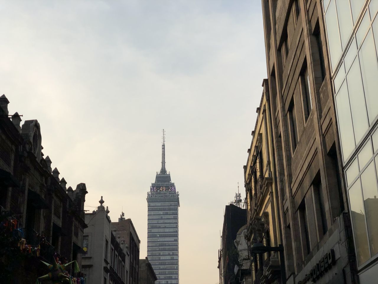 LOW ANGLE VIEW OF BUILDINGS IN CITY