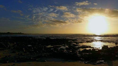 Scenic view of sea at sunset