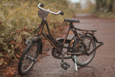 Close-up of bicycle toys on field