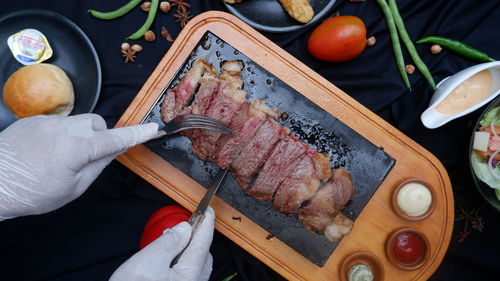 Midsection of man preparing food