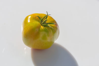 Close-up of apple against white background