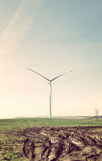 Wind turbines on field