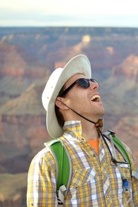 Happy man laughing at grand canyon national park