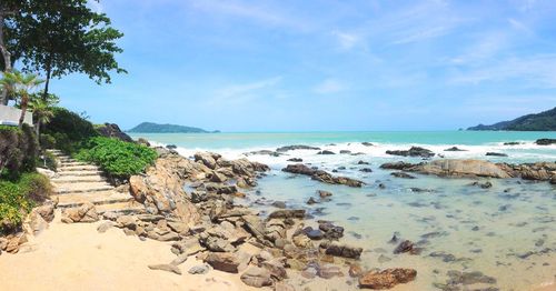 Scenic view of sea against blue sky