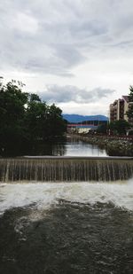 Scenic view of river against sky