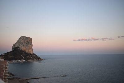 Scenic view of sea against sky at sunset