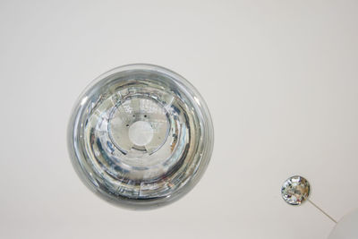 High angle view of glass against white background