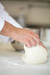 Close-up of hand holding bread