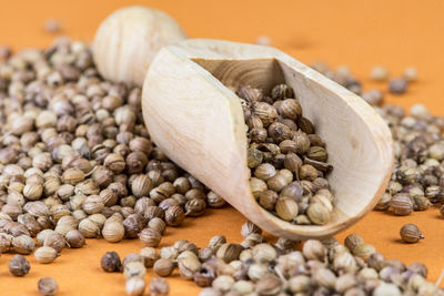 Close-up of coffee beans on table