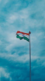 Low angle view of flag against sky