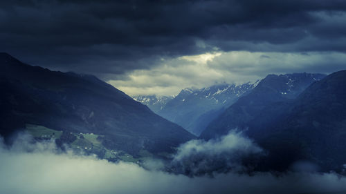 Scenic view of snowcapped mountains against sky