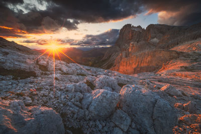 Scenic view of landscape against sky during sunset