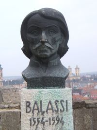 Close-up of old statue against clear sky