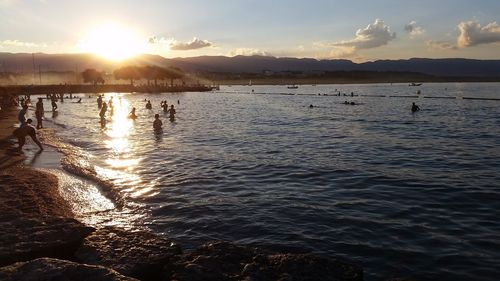 Scenic view of sea at sunset