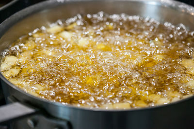 Close-up of meat in cooking pan