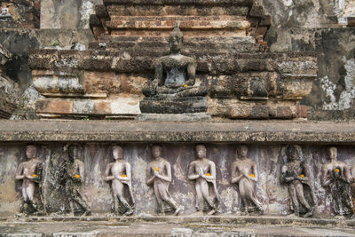 View of statues against wall