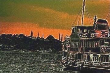 Boat in sea at sunset