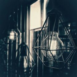 Close-up of electric lamp hanging