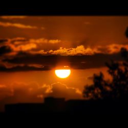 Scenic view of dramatic sky during sunset