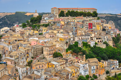 Aerial view of town and buildings in city