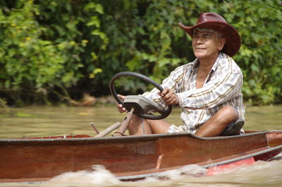 Man boating on river