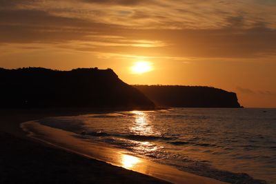 Scenic view of sea against sky during sunset