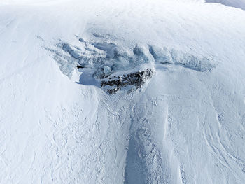 High angle view of snow covered land